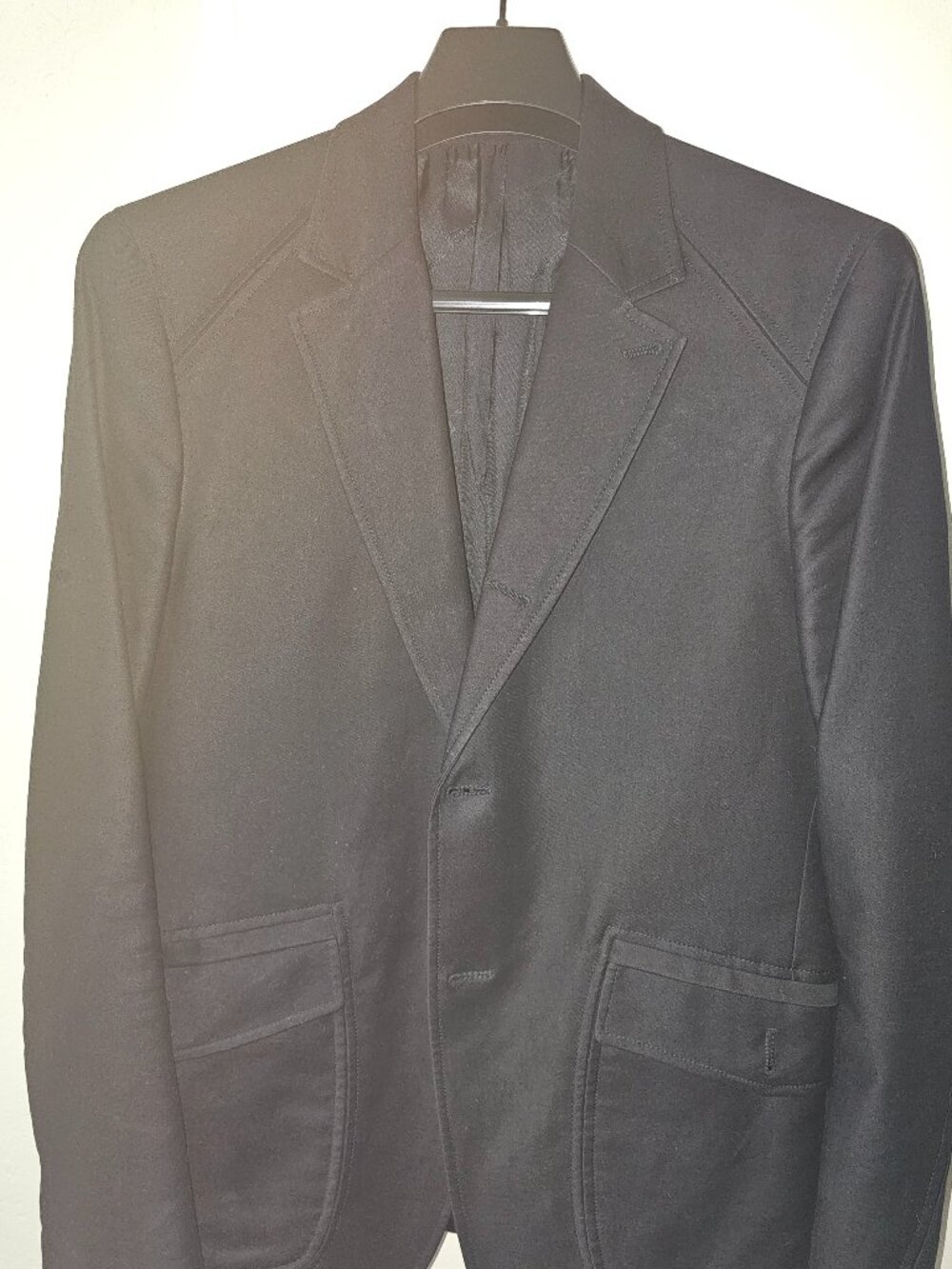 Salvatore Ferragamo beautiful piping and trim on shoulders and pockets.